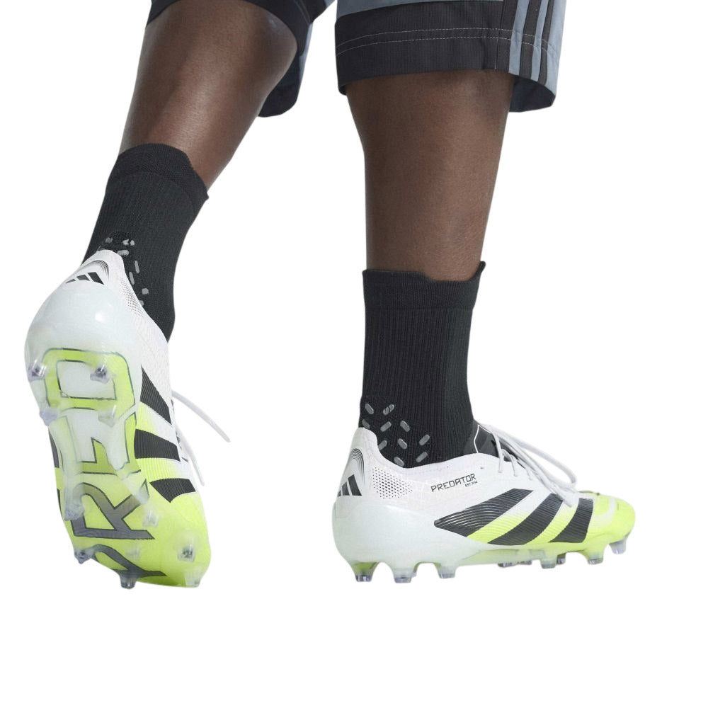 Guayos Predator Elite para terreno firme